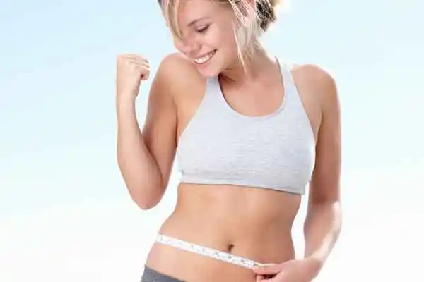 woman happy after fat reduction treatment Wellingborough