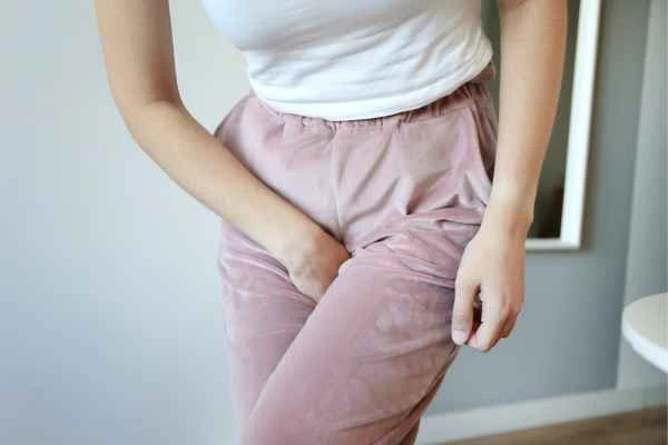 woman struggling with urine incontinence Wellingborough